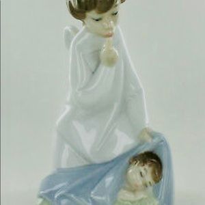 Lladro Figurine
Angel with sleeping baby